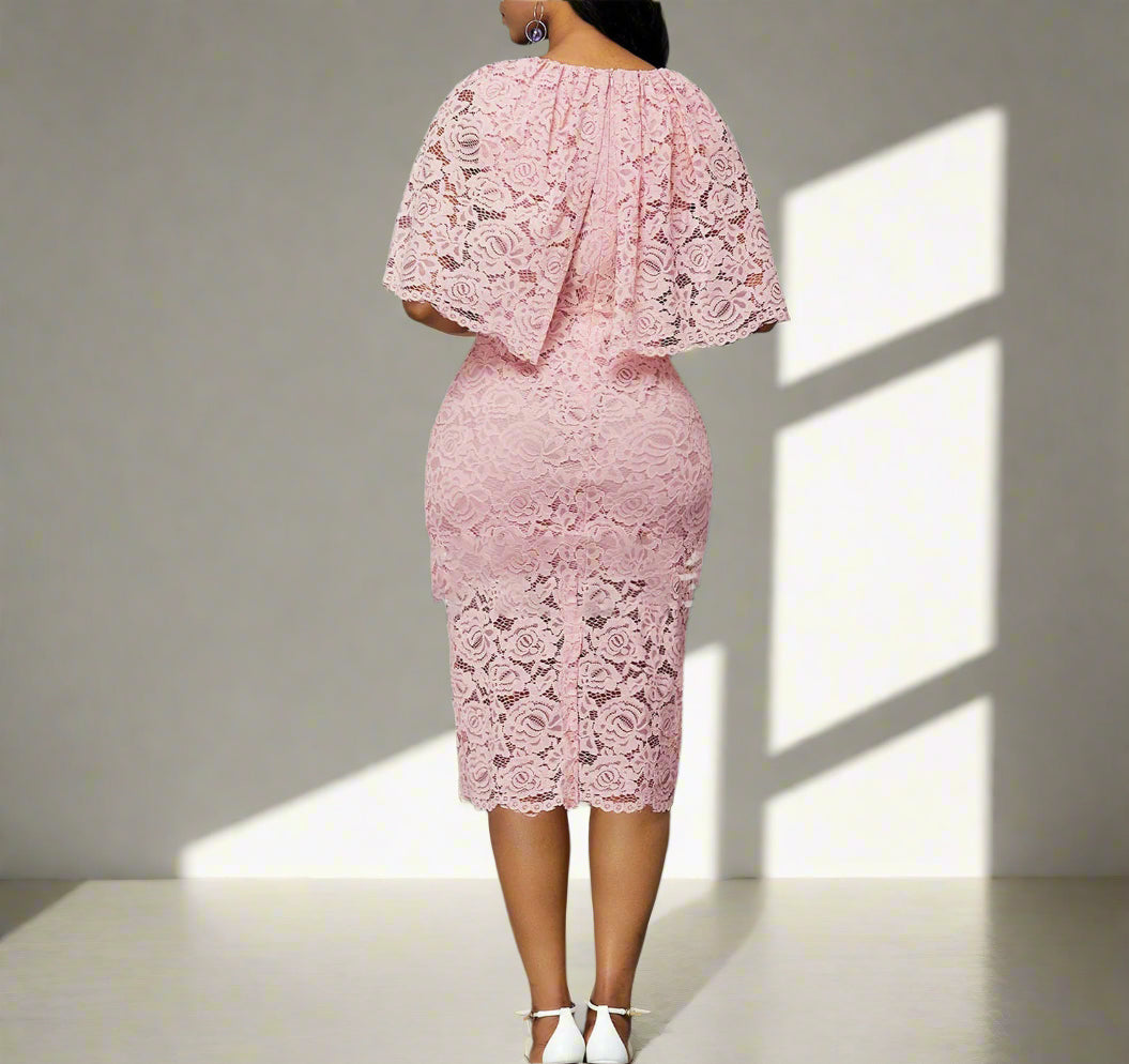 short pink midi dress with lace detailing and short sleeves.