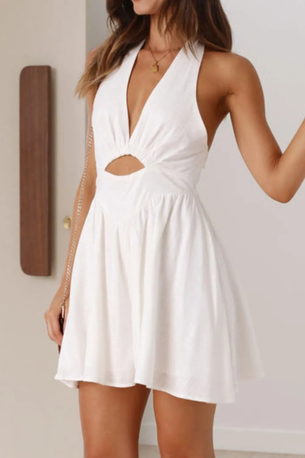 White dress with cut-out design 