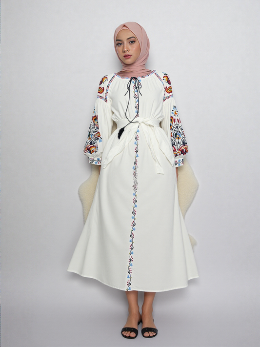 white embroidered midi dress, long sleeves, with adjustable tie